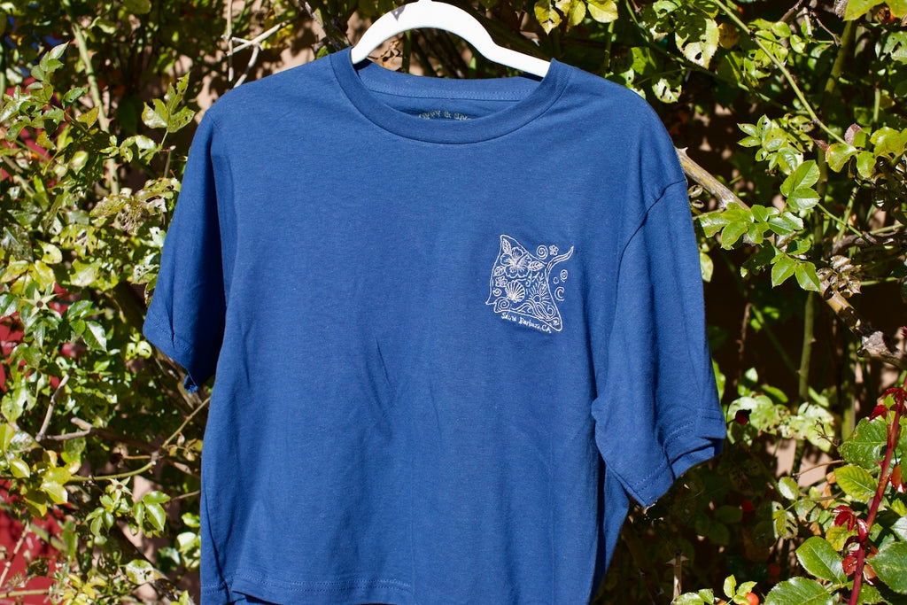 Embroidered stingray design on a baby blue cropped t-shirt with ‘Santa Barbara, CA’ text underneath.